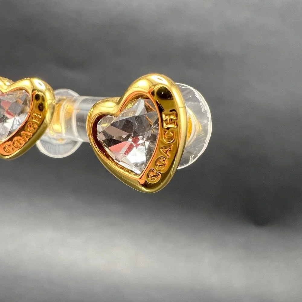 Coach Heart Stud Earrings Gold Tone Clear Crystal Logo Engraved Romantic Jewelry - Picture 2 of 7